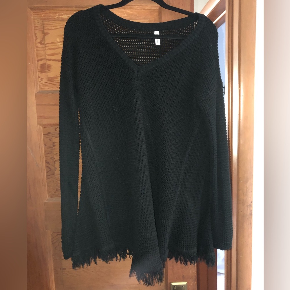 Adorable black boutique sweater